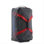 Patagonia Black Hole Wheeled Duffel 70L i farven Smolder Blue / Amanita Red